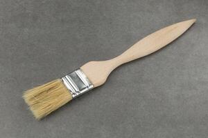 New Paint brush on a gray background photo