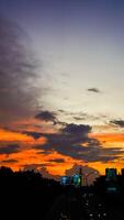 bintaro jakarta, january 26, 2024 - Sunset in the city, Silhouette of a cityscape. photo