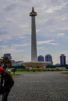 Central Jakarta, January 30, 2024 - beautiful view of the national monument with clear skies during the day. photo