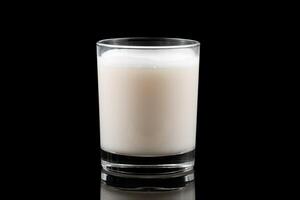 A glass of protein on a black background photo
