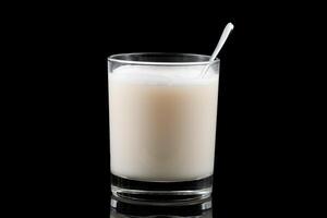 A glass of protein on a black background photo