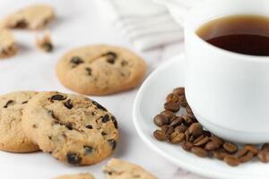 Coffee with cookies on the table photo