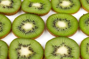 Sliced kiwi. Kiwi texture or background. Texture of kiwi photo