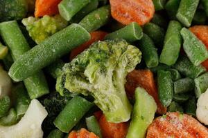 Frozen vegetables close-up. Frozen Frosty Vegetables photo