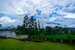 beautiful landscape view on mountain with pretty clouds. photo