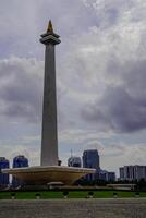 Central Jakarta, January 30, 2024 - beautiful view of the national monument with clear skies during the day. photo