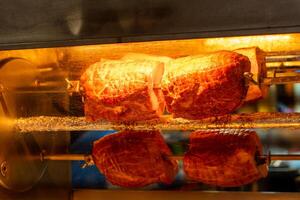 rack of meat is cooking in an oven photo