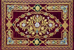 Colorful vintage rug made by hand. Oriental needlework of the 19th century. Abstract background. photo