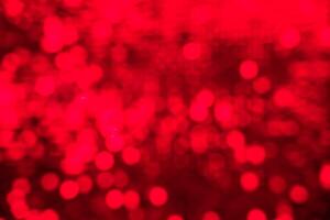 Abstract red blurred festive background. photo