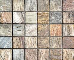 Texture of a decorative brick-like tiles. Abstract background for design. photo