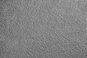 Monochrome texture of shiny grained metal. Abstract background. photo