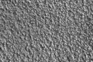 Monochrome texture of shiny grained metal. Abstract background. photo