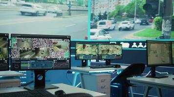 Government satellite CCTV system in empty monitoring room with traffic surveillance via footage. Public safety on the highways ensured by the national security department offices. video