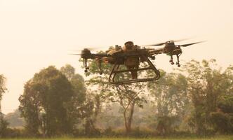 An agricultural drone while use to soil and field analysis. They can be used to mount sensors to evaluate moisture content in the soil, terrain conditions etc. photo