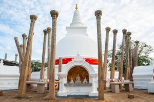 Thuparamaya stupa in ancient city of Anuradhapura, Sri Lanka. photo