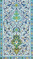 Geometric traditional Islamic ornament. Fragment of a ceramic mosaic. photo