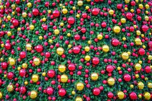 Christmas toys and balls on an artificial spruce. photo