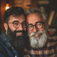 Smiling hipster son hugging elderly father with beard. Two generations of men enjoy meeting on Father's Day. photo