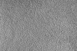 Monochrome texture of shiny grained metal. Abstract background. photo