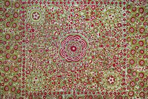 Colorful vintage rug made by hand. Oriental needlework of the 19th century. Abstract background. photo