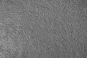 Monochrome texture of shiny grained metal. Abstract background. photo