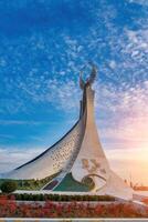 UZBEKISTAN, TASHKENT - JANUARY 4, 2023 Monument of Independence in the form of a stele with a Humo bird in the New Uzbekistan park. photo