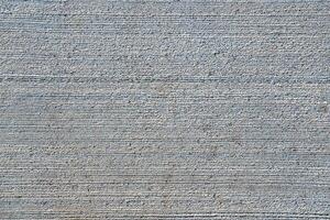 Texture of gray scratched concrete. Abstract background. photo