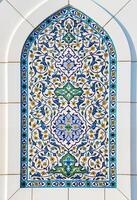 Geometric traditional Islamic ornament. Ceramic mosaic. photo