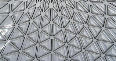 The steel inner part of the roof with the framework of the Chorsu Bazaar in Tashkent. Geometric architectural background. photo