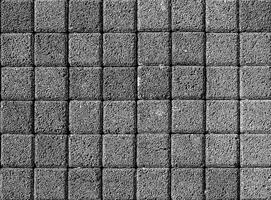 The texture of a stone monotonous pavement. Top view. Abstract background. photo