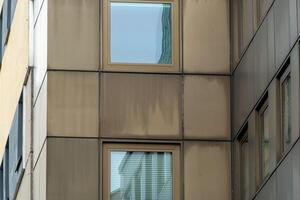 facade of residential buildings in a city center photo