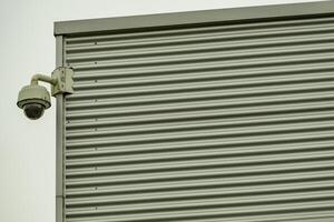 metal cladding on the wall of an industrial building photo