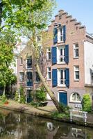 old house on a canal in the netherlands photo