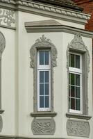 details of a 120 year old residential building in the city photo