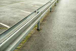 guardrail divides the road photo