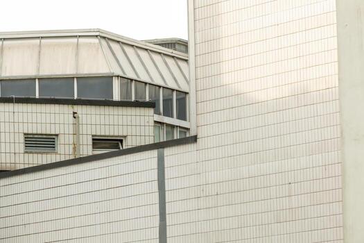 poorly maintained apartment building facade from the 70s photo