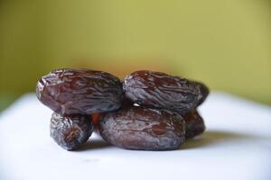 Close-up of organic gourmet Medjool date fruit at the market. View from above. photo