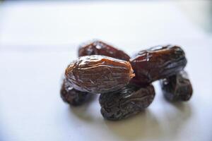 Close-up of organic gourmet Medjool date fruit at the market. View from above. photo