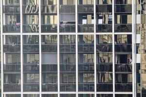 Facade of modern building in Singapore photo