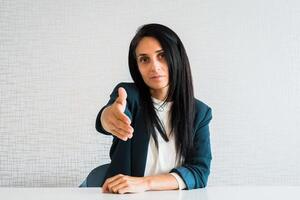 Young caucasian brunette business woman director in office photo