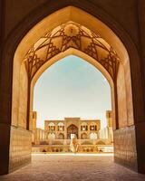 Kashan, Iran - 29th may, 2022 - Tourists and pilgrims explore sightseeing beautiful Agha Bozorg Mosque photo