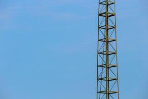 Television antennas that are mounted on the roof of the house photo