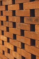 The arrangement of the bricks arranged in such a way forms a very beautiful building wall photo