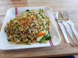 One of the signature dishes from Indonesian restaurants, Nasi Goreng Bebek Cabe Ijo. photo