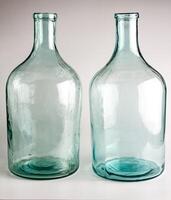Empty old glass jars with a narrow neck for wine and spirits. Made in the USSR around 1930s photo