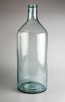 Empty old glass jar with a narrow neck for wine and spirits. Made in the USSR around 1930s photo