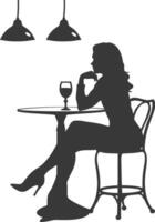 silueta mujer sentado a un mesa en el café bar restaurante negro color solamente vector