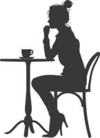 Silhouette woman sitting at a table in the cafe bar restaurant black color only vector