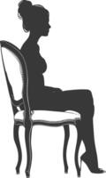 Silhouette woman sitting in the chair black color only vector