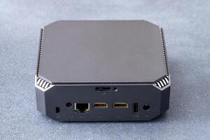 A small system unit of a personal computer. Compact device. photo